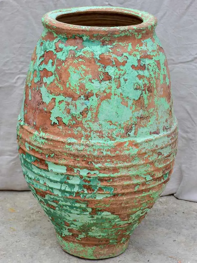 Two very large antique Spanish olive oil jars - blue and green